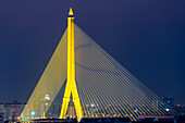  The illuminated Rama VIII Bridge over the Mae Nam Chao Praya River, Bangkok, Thailand, Asia 