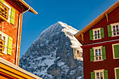The Famous and Historical Hotel Bellevue des Alpes at 2061 Meters High Up and Mountain Peak of North Face of Eiger 3907 Meter High in a Sunny Winter Day in Kleine Scheidegg, Grindelwald, Canton Bern, Switzerland.