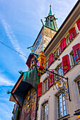 The Zeitglockenturm Clock Tower and Colorful House Facades on the Market Square in the Heart of the Baroque Old Town with Sunlight in a Sunny Autumn Day in Solothurn, Canton Solothurn, Switzerland.