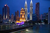 Malaysia, Kuala Lumpur, Pintasan Saloma footbridge, Public Bank, Petronas Towers