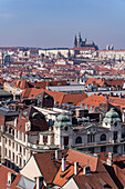 View of the Old Prague areas from the top in misty morning