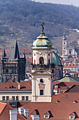 View of the Old Prague areas from the top in misty morning