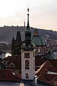 View of the Old Prague areas from the top in misty morning