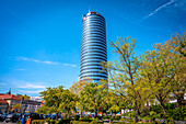  Jentower behind trees under a clear sky, Jena, Thuringia, Germany 