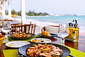  Tunisian Mechouia salad made from grilled vegetables with tuna and capers, served in the beach restaurant overlooking Hammamet 