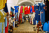  Souk Il Balgha with traditional Tunisian clothing in the Medina in Nabeul, Tunisia 