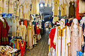 Souk Souk Il Balgha with traditional Tunisian clothing in the Medina in Nabeul, Tunisia 