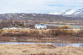  Motorhome in landscape, Dovrefjell-Sunndalsfjella National Park, Fylke Innlandet, Norway, Scandinavia 