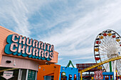 End of iconic Route 66 at Santa Monica Pier and carousel, Los Angeles, USA
