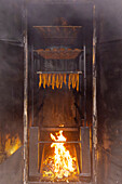  Fish in a smoker, Usedom Island, Mecklenburg-Western Pomerania, Germany 