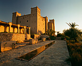The landscaped gardens of Hotel Kasbah Ben Moro, a restored traditional Kasbah in Skoura, near Ouarzazate, Morocco