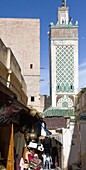 Morocco, Fès, Medina, souk, shop, people, minaret