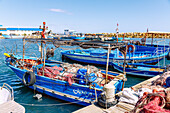 Harbor with fishing boats and fishing nets in Hergla, Tunisia 