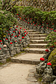 Path to the Daisho-in Temple, adorned with 500 Rakan Statues in knitted hats, Miyajima Island, Hiroshima Prefecture, Japan.