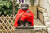 Statue of a mother monkey and her child at the Hie-jinja Shrine, Nagatachō, Chiyoda, Tokyo, Japan. This statue is said to bring blessings to pregnant women, or women who want to get pregnant.