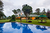 Swimming pool of Norwood Bungalow overlooking the Castlereagh Lake, luxury Ceylon Tea Trails resort, near Hatton, Sri Lanka, Indian subcontinent, South Asia