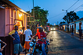 Small shop on  the side of the road at dusk,Sao Tome Island, Republic of Sao Tome and Principe,Africa