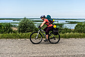  Cyclists at Lake Lubān, Latvia 