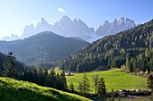  in the Villnößtal valley at the church of St. Johann, view of the Geisler Group, Dolomites, South Tyrol, Italy 