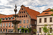  The Luna Fountain at the market square of the Hanseatic city of Lüneburg, Lower Saxony, Germany 