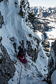  Ski tourer on the steep north side of the Rauschberg, Chiemgau Alps, Bavaria, Germany 