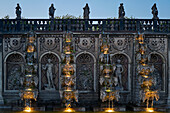  Illuminated historic fountain at dusk, Herrenhäuser Garden, Hanover, Germany 