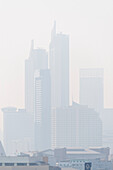  View from the Golden Mount through smok, poor visibility, high humidity of the skyline of Bangkok, Thailand, Asia 