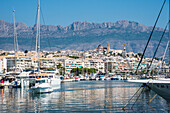  Altea, white mountain village of the Costa Blanca, with harbor and Bernia massif in the background, Alicante province, Spain 