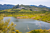  Zahara de la Sierra, white mountain village with castle in the Sierra Grazalema, with reservoir, Andalusia, Cadiz Province, Spain 