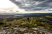  Hikers on the Sör-Stubba, Muddus National Park, Norrbotten County, Sweden 
