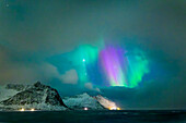  Northern lights shining through cloud windows, Tungeneset, Senja, Troms, Norway 