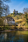  At the Elzbach stream below Pyrmont Castle, Southern Eifel, Münstermaifeld, Rhineland-Palatinate, Germany 