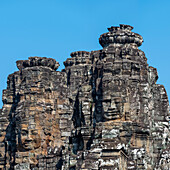  Panoramic image of giant stone-carved faces of Bodhisattva Lokeshvara, also known as Avalokiteshvara, Bayon Temple, Angkor Thom, UNESCO World Heritage Site, Angkor Wat, Siem Reap, Cambodia, Asia 