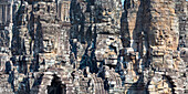  Panoramic image of giant stone-carved faces of Bodhisattva Lokeshvara, also known as Avalokiteshvara, Bayon Temple, Angkor Thom, UNESCO World Heritage Site, Angkor Wat, Siem Reap, Cambodia, Asia 