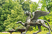  Bronze griffin sculpture in Branitz Park in front of Branitz Castle, a landscape park created in 1846 by Prince Hermann von Pückler-Muskau in Branitz, Cottbus, Spree-Neisse district, Brandenburg, Germany 