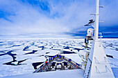  Expedition ship between the ice floes, Arctic Ocean, North Polar Ocean, Northern Polar Sea, Spitsbergen, Svalbard, Norway 