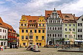  Town houses and the Meissen logo on the market square in Meissen, Saxony, Germany 