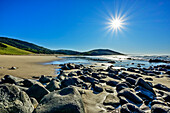 Sandy beach on the Indian Ocean with boulders in the foreground, Wild Coast Trail, Wild Coast, Eastern Cape, South Africa 