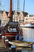  Idyllic houses and boat in Amsterdam, Netherlands 