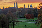  View from the Monopteros over the English Garden to the towers of the Frauenkirche and the towers and dome of the Theatinerkirche, Munich, Bavaria, Germany 