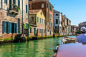  By taxi boat through the Rio de la Guerra in Venice, Italy  