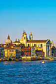  View of Venice as a sailing ship departs on the Grand Canal, Venice, Italy 