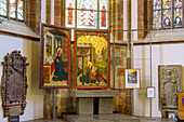  Interior of St. Martin&#39;s Church and altar with adoration images by an unknown Swabian master from the 15th century in Kirchheim unter Teck, Baden-Württemberg, Germany 