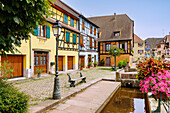  Place du Bouc with town stream in Ribeauvillé, Alsace, France 