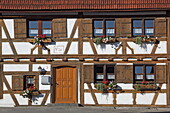  Timber-framed facade of a house in the center of Bad Grönenbach, Allgäu, Swabia, Bavaria, Germany 