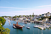  Port Rhu harbor with marina, Scarweather lighthouse, and Port Museum in Douarnenez, Cornouaille, Finistere, Brittany, France 