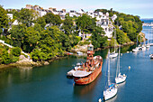  Port Rhu harbor with marina, Scarweather lighthouse, and Port Museum in Douarnenez, Cornouaille, Finistere, Brittany, France 