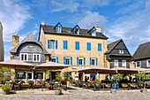  Historic houses with restaurants and cafes at Place Les Halles in the picture-book village of Le Faou, Finistere, Brittany, France 