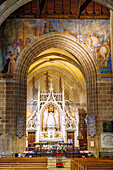  Interior of the Basilica of Notre-Dame-du-Roncier with frescoes and altar in the old town of Josselin, Morbihan, Brittany, France 