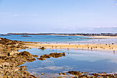 View from the fortified island of Ville Close in Saint-Malo towards Plage de l'Eventail at low tide and the beaches of the Côte d'Emeraude, Côtes-d'Armor, Brittany, France